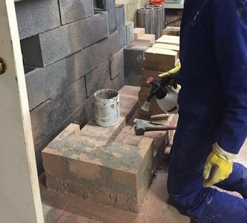 mason stove- brick laying